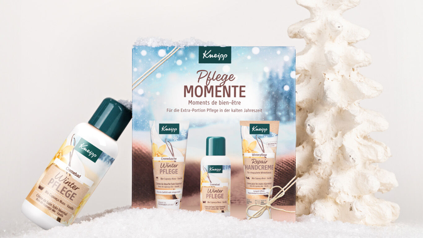 Kneipp Geschenkpackung Pflegemomente in weihnachtlichem Setting.