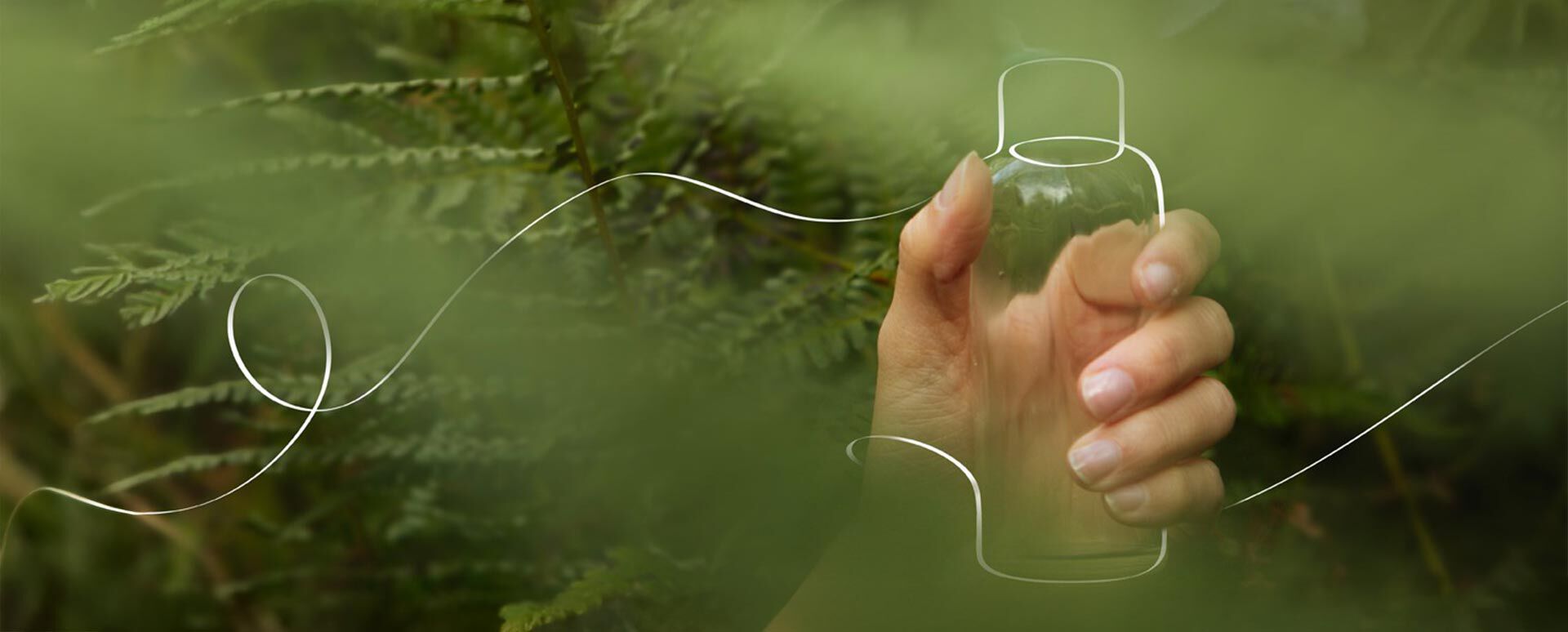 Hand greift eine imaginäre Flasche, die man als weiße Linien sieht. 