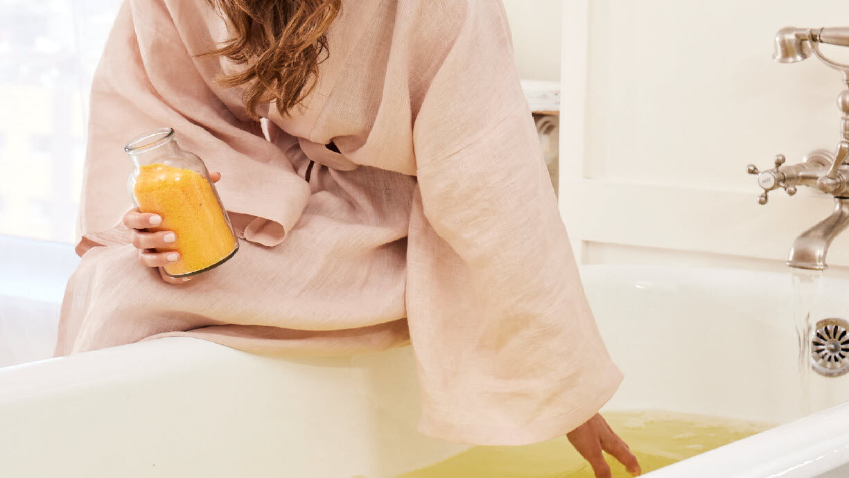 woman enjoying a Kneipp joint & muscle bath 