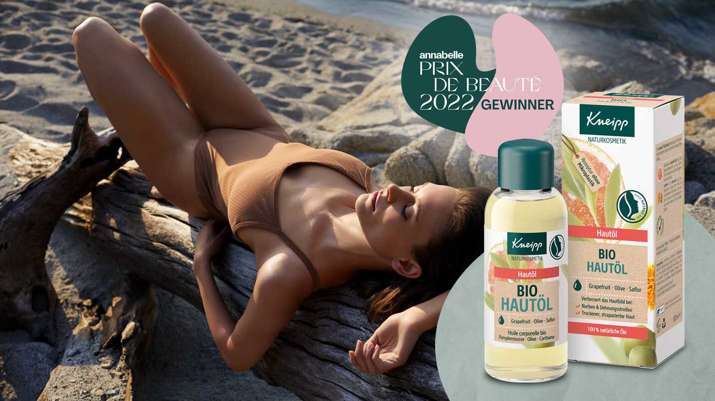 Frau am Strand. Bio-Hautöl.